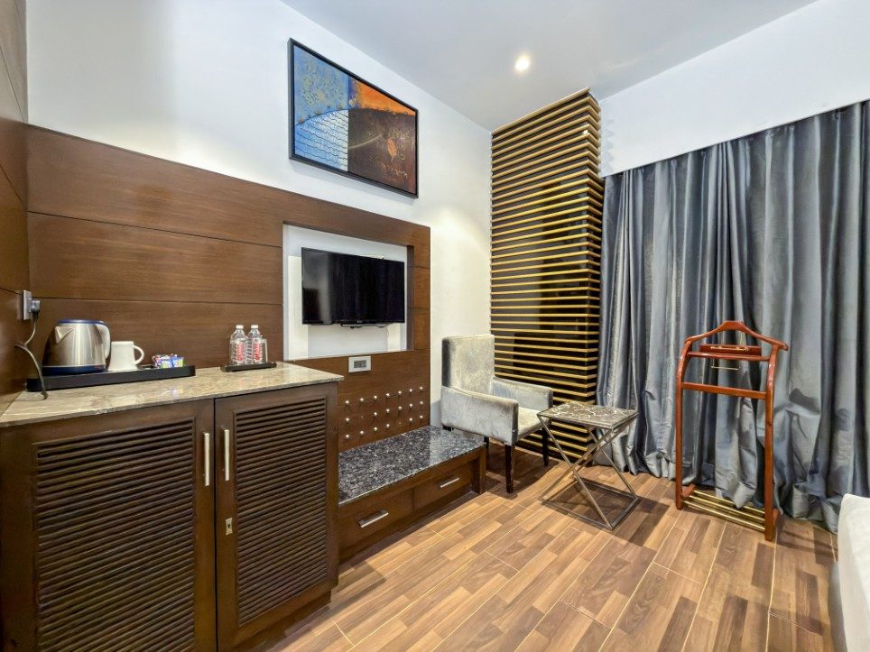 Sideboard with television and tea tray in a Business Room, Hotel Sawera Grand