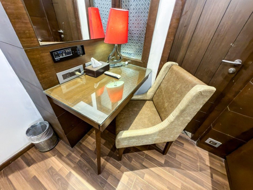 Writing desk and upholstered armchair in the Executive Room, Hotel Sawera Grand